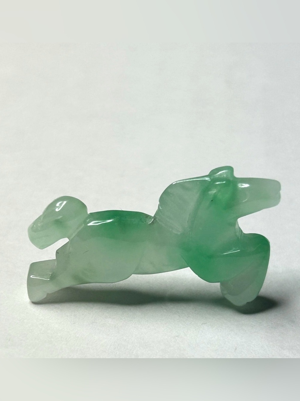Heirloom jade horse motif pendant